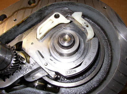 Whirlpool direct drive transmission with spin gear out